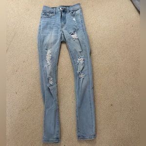 Light high rise skinny jeans